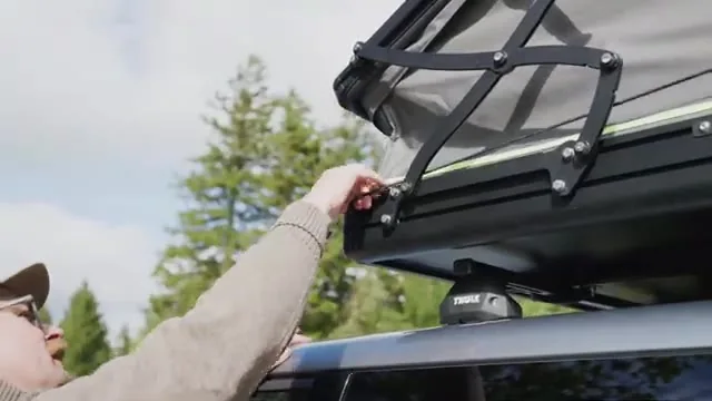 Outwell Coombs 135-X hard-shell roof tent opening mechanism